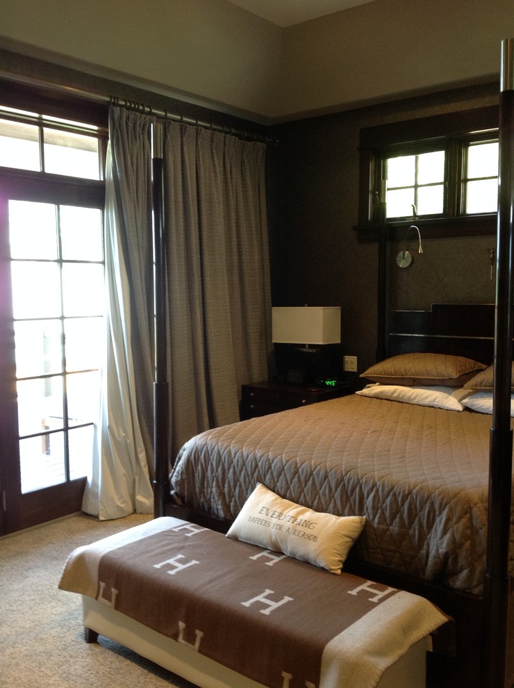 This is an example of a mid-sized contemporary master bedroom in Philadelphia with brown walls and carpet.