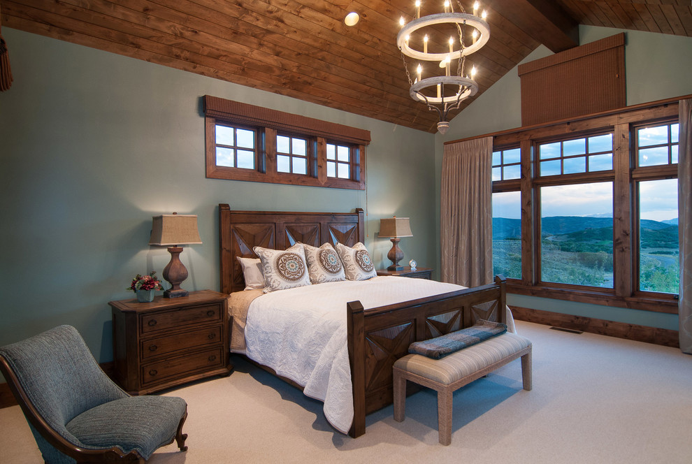 Inspiration for a traditional master bedroom in Salt Lake City with grey walls and carpet.