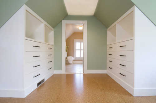 clothes' storage built along sloped ceilings