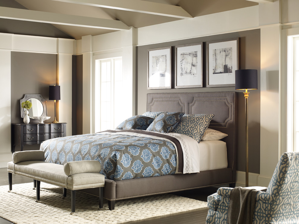 Design ideas for a mid-sized traditional master bedroom in Milwaukee with grey walls and ceramic floors.