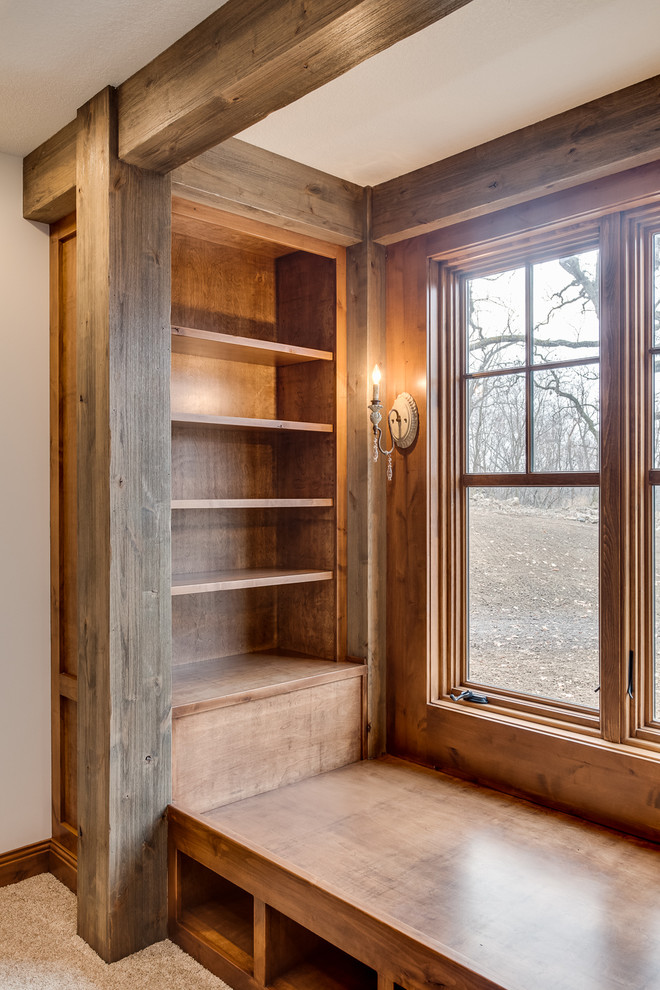 Home design - bedroom and large rustic girl carpeted home design idea with beige walls