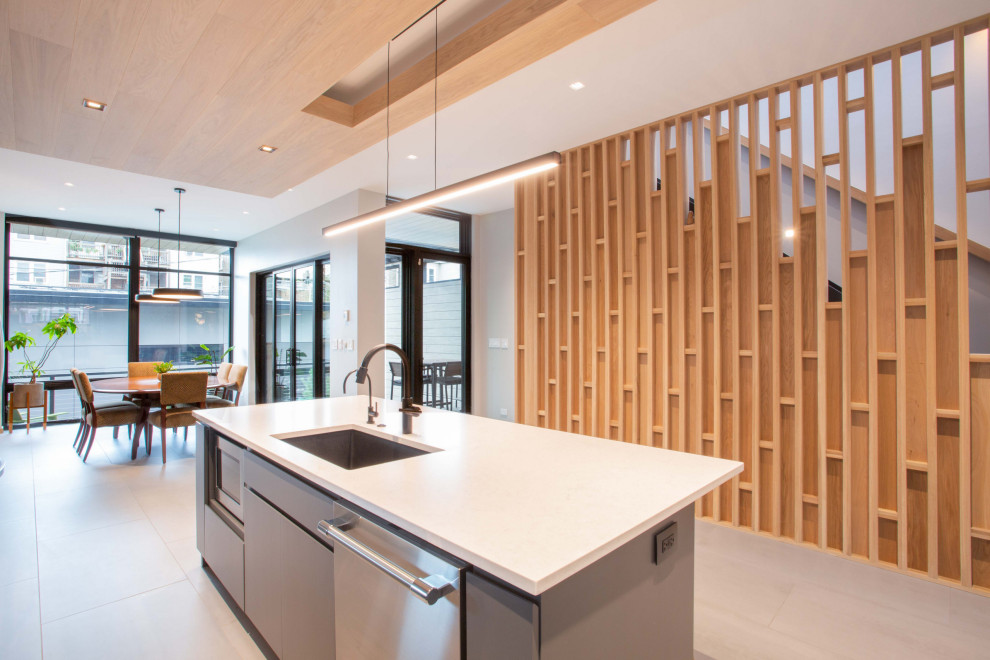 Contemporary Kitchen With Architectural Wood Divider