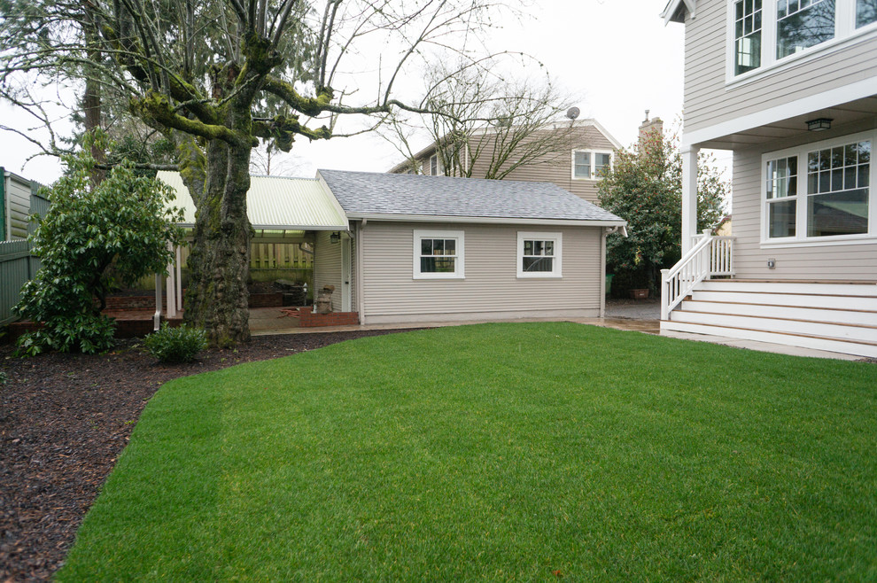 This is an example of a mid-sized arts and crafts two-storey exterior in Portland with concrete fiberboard siding.