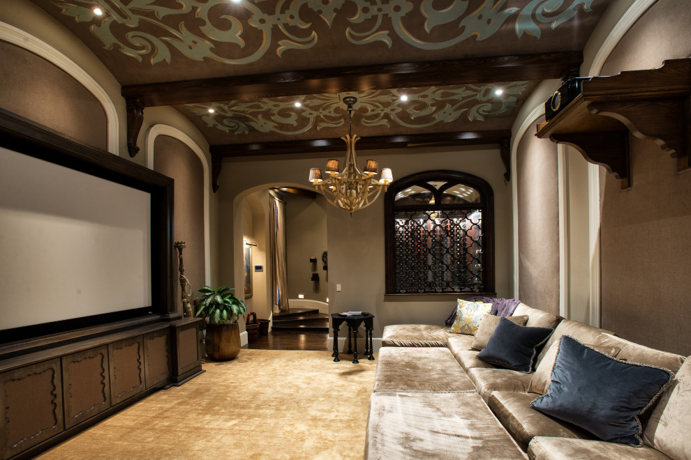 This is an example of a large mediterranean home theatre in Austin.