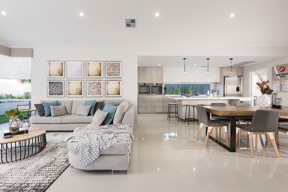 Large modern open concept living room in Perth with porcelain floors and a wall-mounted tv.