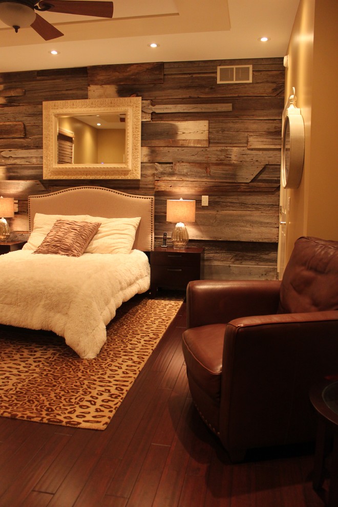 Inspiration for a transitional master bamboo floor bedroom remodel with yellow walls