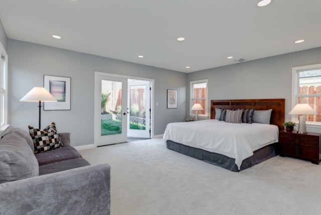 Inspiration for a large transitional master bedroom in Los Angeles with grey walls, carpet and no fireplace.