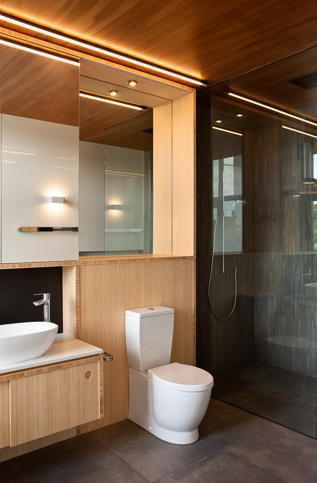 Design ideas for a mid-sized contemporary master bathroom in Auckland with furniture-like cabinets, light wood cabinets, an open shower, white walls and porcelain floors.