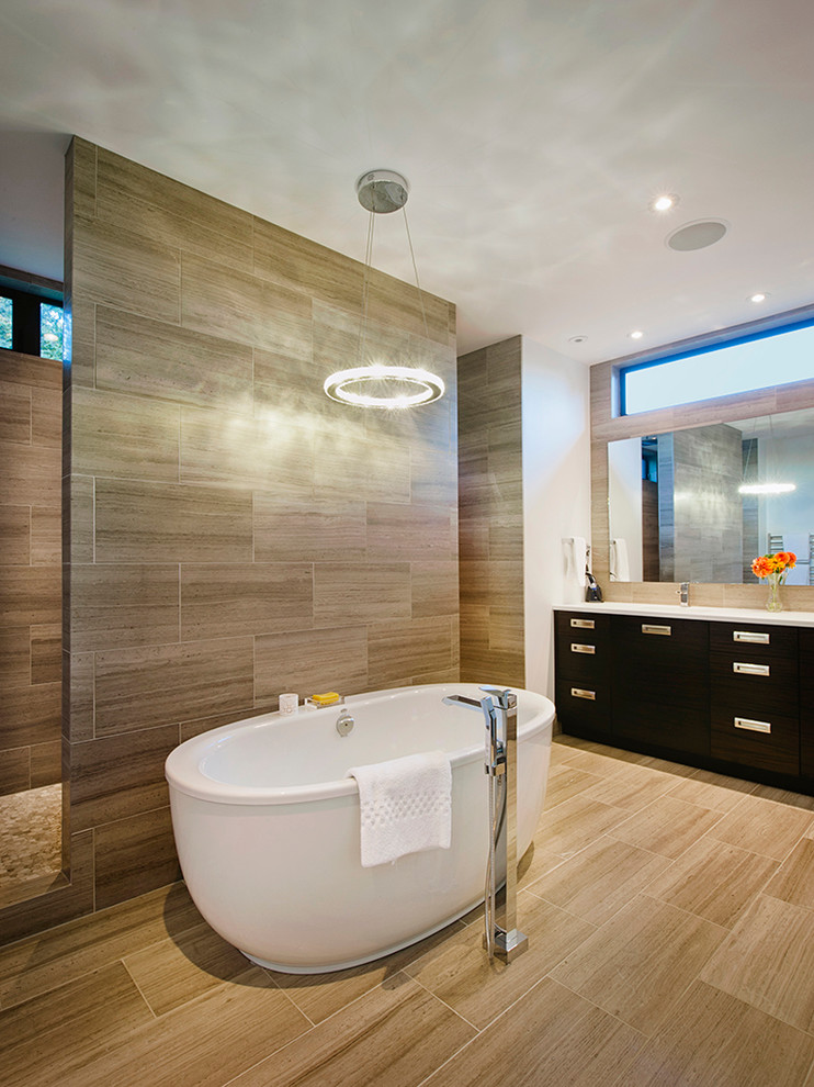 This is an example of a contemporary bathroom in Vancouver with a freestanding tub.