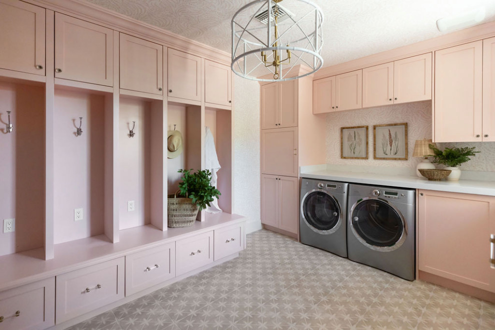 This is an example of a large beach style laundry room in Phoenix with an undermount sink, shaker cabinets, quartz benchtops, white walls, ceramic floors, a side-by-side washer and dryer, grey floor, white benchtop, wallpaper and wallpaper.