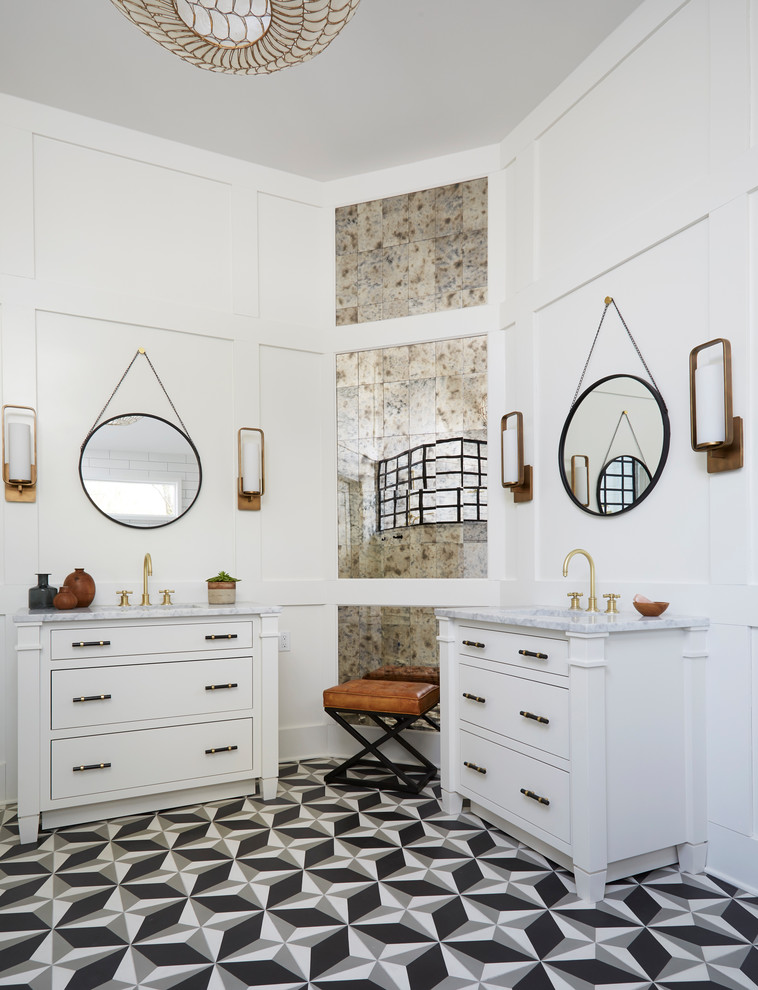 Transitional bathroom in Chicago with white cabinets, mirror tile, white walls, an undermount sink, multi-coloured floor, white benchtops, cement tiles and flat-panel cabinets.