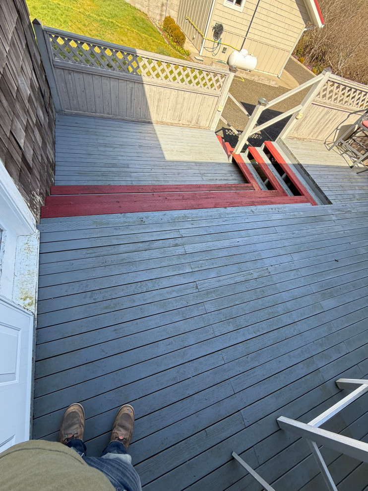 Example of a beach style deck design in Seattle