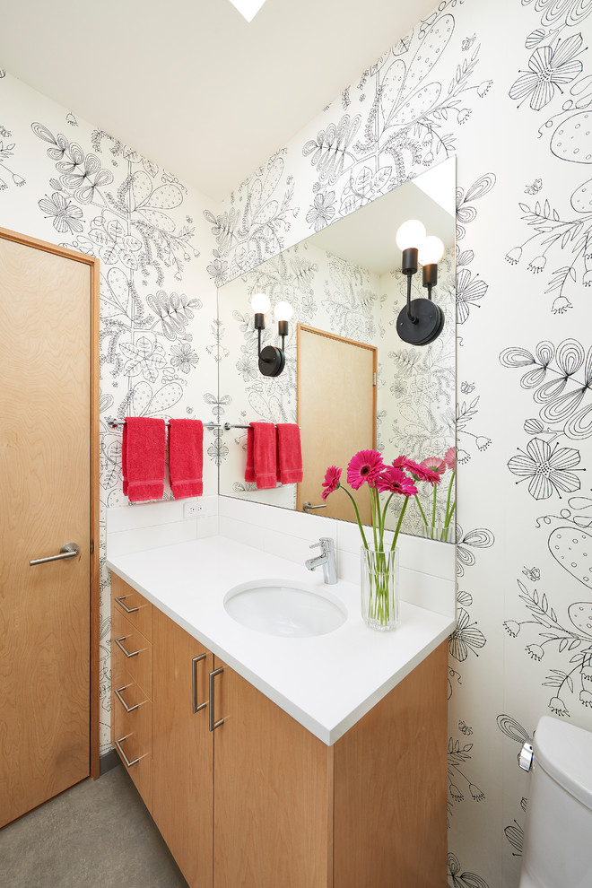 MidLife Move to a MidCentury Midcentury Powder Room Seattle by CTA Design Builders, Inc.