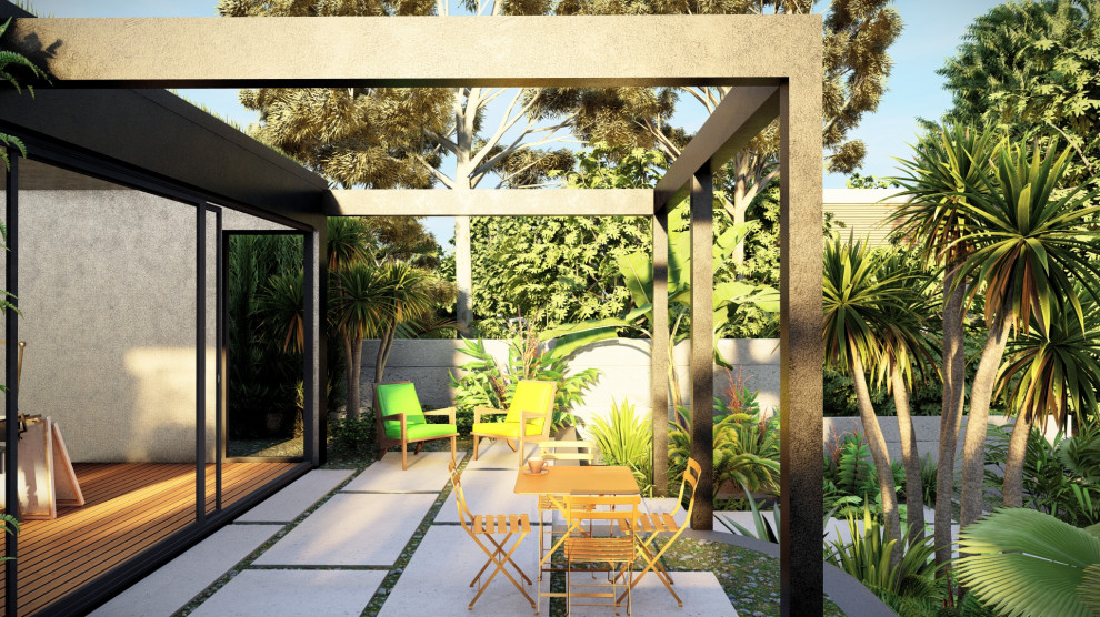 Idee per un grande giardino formale tropicale esposto a mezz'ombra dietro casa in estate con fontane, pavimentazioni in cemento e recinzione in pietra