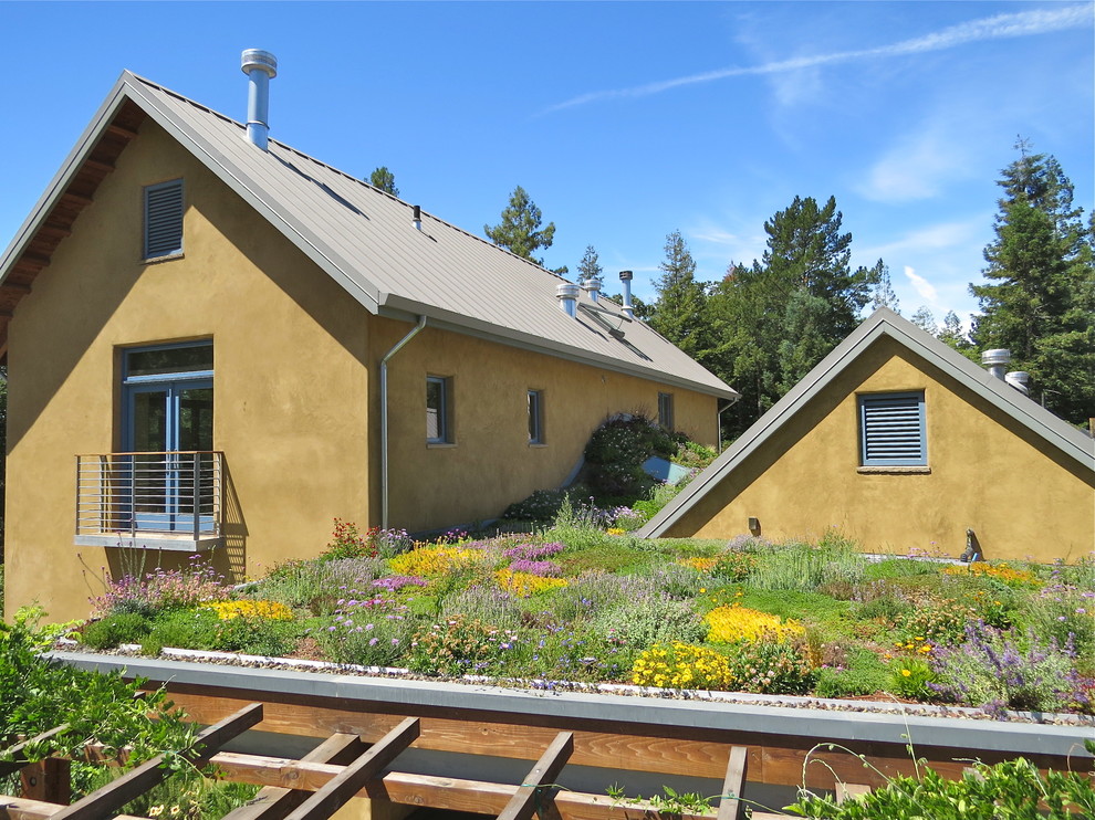 Design ideas for a country exterior in San Francisco with a flat roof.