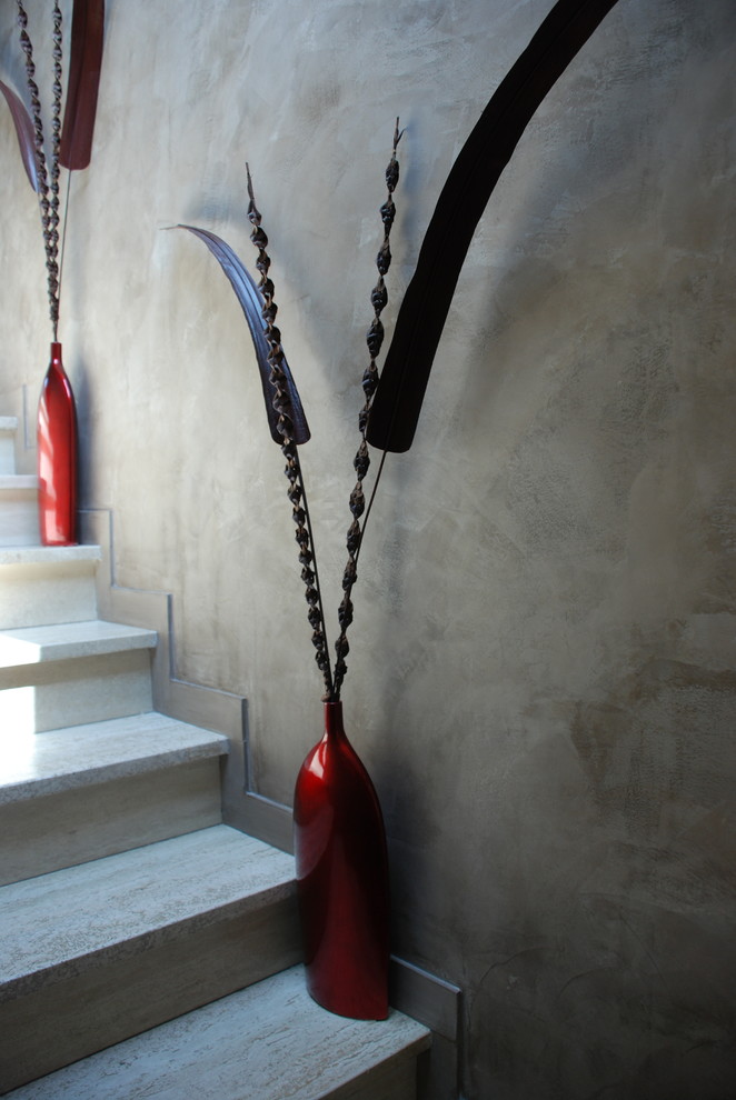 Inspiration for a mid-sized transitional marble straight staircase remodel in Paris with marble risers