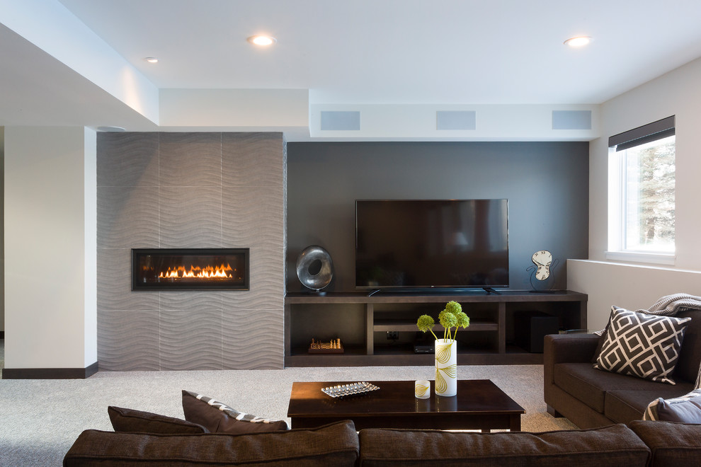 Photo of a mid-sized contemporary open concept living room in Other with multi-coloured walls, carpet, a ribbon fireplace, a tile fireplace surround and grey floor.