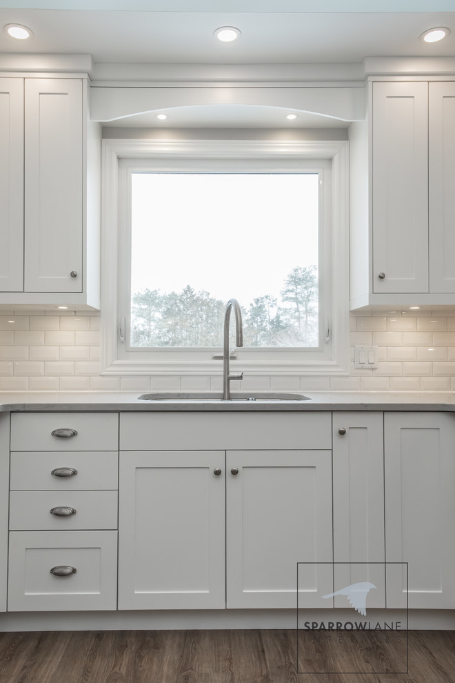 Transitional home design photo in Toronto