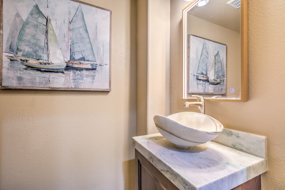 Example of a transitional home design design in Las Vegas