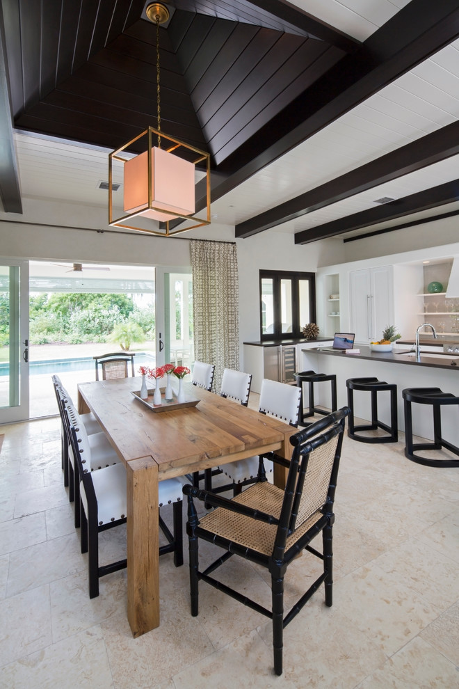 Photo of a transitional kitchen/dining combo in Charleston with beige floor.