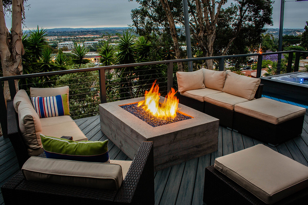 Mid-sized contemporary backyard deck in San Diego with a fire feature and no cover.