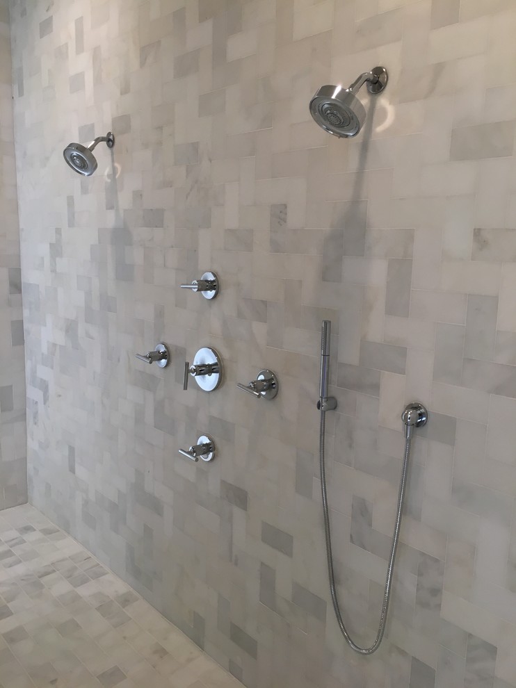 Double shower - mid-sized transitional master white tile and marble tile porcelain tile and white floor double shower idea in Houston with shaker cabinets, white cabinets, a two-piece toilet, white walls, an undermount sink and marble countertops