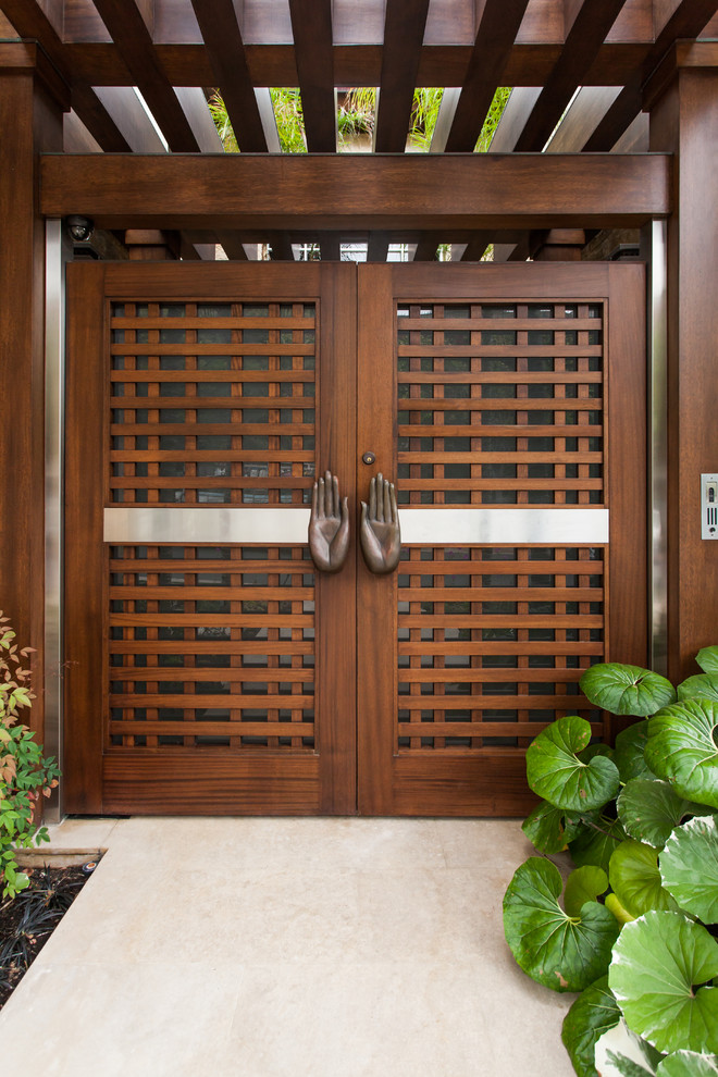 Inspiration for a tropical entryway in Orange County.