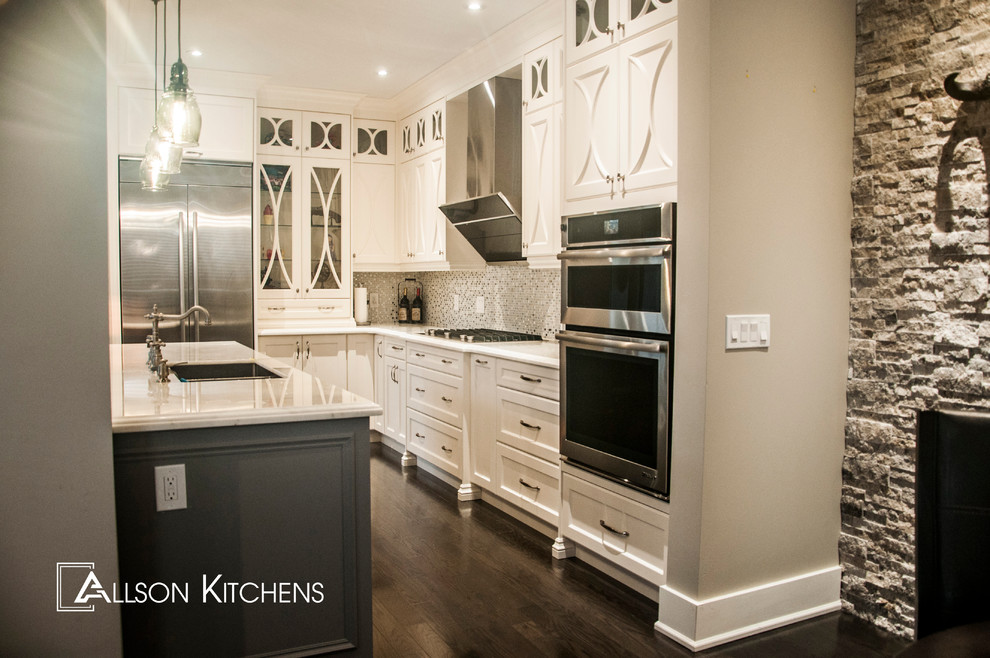 Example of a transitional kitchen design in Toronto