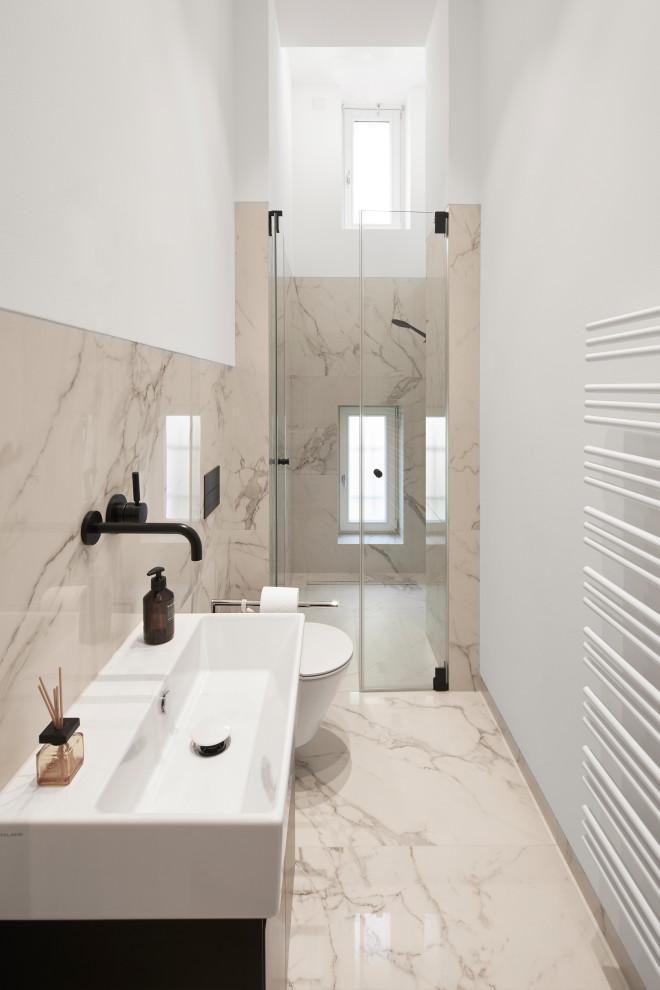 Inspiration for a small modern bathroom in Other with flat-panel cabinets, brown cabinets, a curbless shower, a wall-mount toilet, marble, marble floors, a vessel sink, solid surface benchtops, beige floor, white benchtops, a single vanity, a floating vanity, wallpaper and wallpaper.