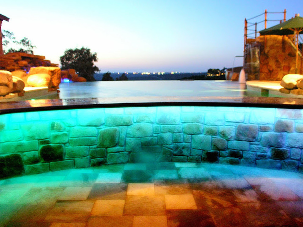 Pool fountain - infinity pool fountain idea in Austin