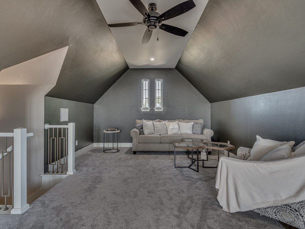 Design ideas for a large farmhouse mezzanine bedroom in Oklahoma City with blue walls, carpet, no fireplace and grey floors.
