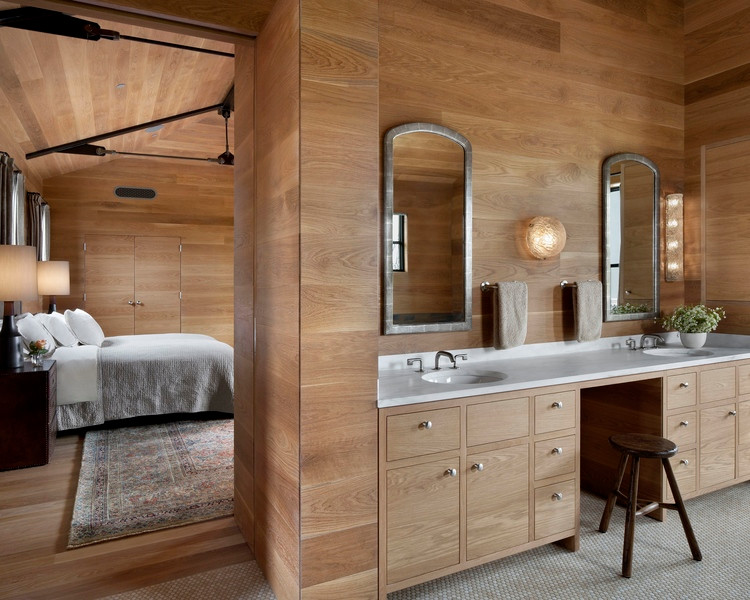 Design ideas for a modern master bathroom in San Francisco with flat-panel cabinets, light wood cabinets, a freestanding tub and an undermount sink.