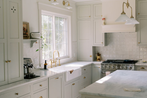 Bright Canadian kitchen with white RTA cabinets demonstrating compact packaging and lower dimensional weight shipping costs