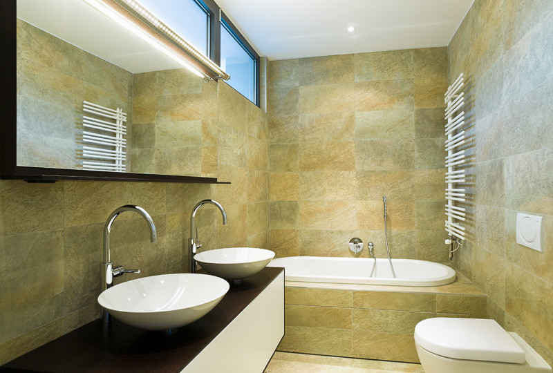 Inspiration for a large transitional master beige floor drop-in bathtub remodel in Denver with flat-panel cabinets, white cabinets, beige walls and a vessel sink