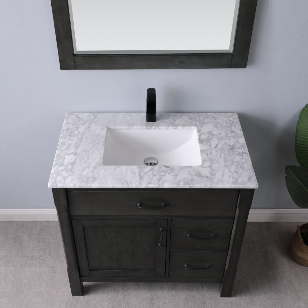 Immagine di una piccola stanza da bagno design con top in marmo e un lavabo