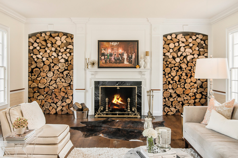 Elegant living room photo in Columbus with white walls, a standard fireplace and a stone fireplace