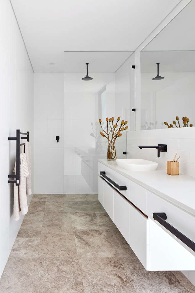 Photo of a contemporary bathroom in Perth with white cabinets, a curbless shower, white walls, marble floors, flat-panel cabinets, a vessel sink, grey floor and white benchtops.