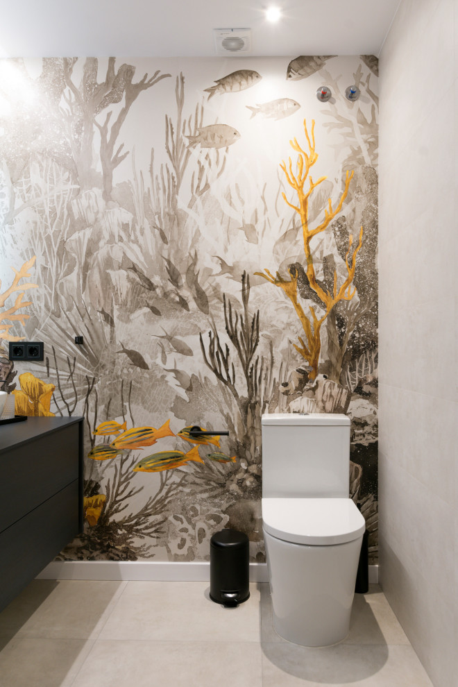 Design ideas for a large contemporary cloakroom in Other with flat-panel cabinets, black cabinets, a two-piece toilet, beige tiles, ceramic tiles, yellow walls, ceramic flooring, a vessel sink, wooden worktops, beige floors, black worktops, a built in vanity unit and wallpapered walls.