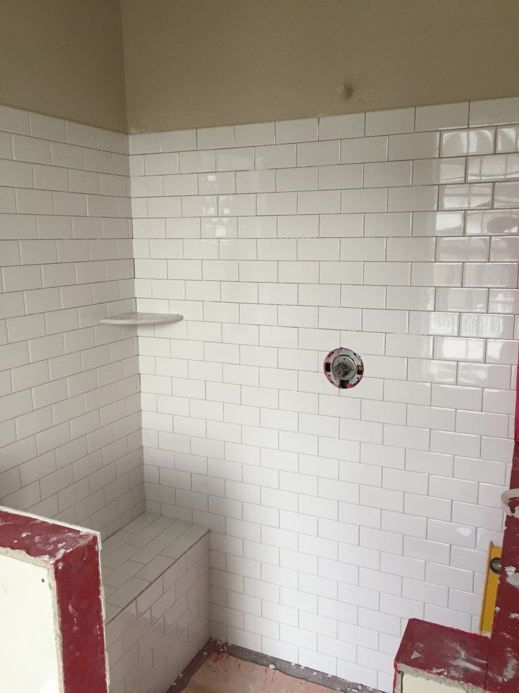 New build shower head on wall not tile