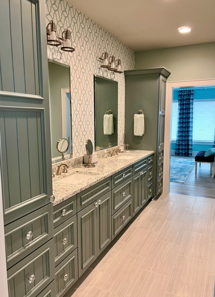 Design ideas for an expansive beach style bathroom in Other with recessed-panel cabinets, green cabinets, a curbless shower, gray tile, ceramic tile, green walls, ceramic floors, an undermount sink, engineered quartz benchtops, grey floor, a sliding shower screen, green benchtops, a double vanity, a built-in vanity and wallpaper.