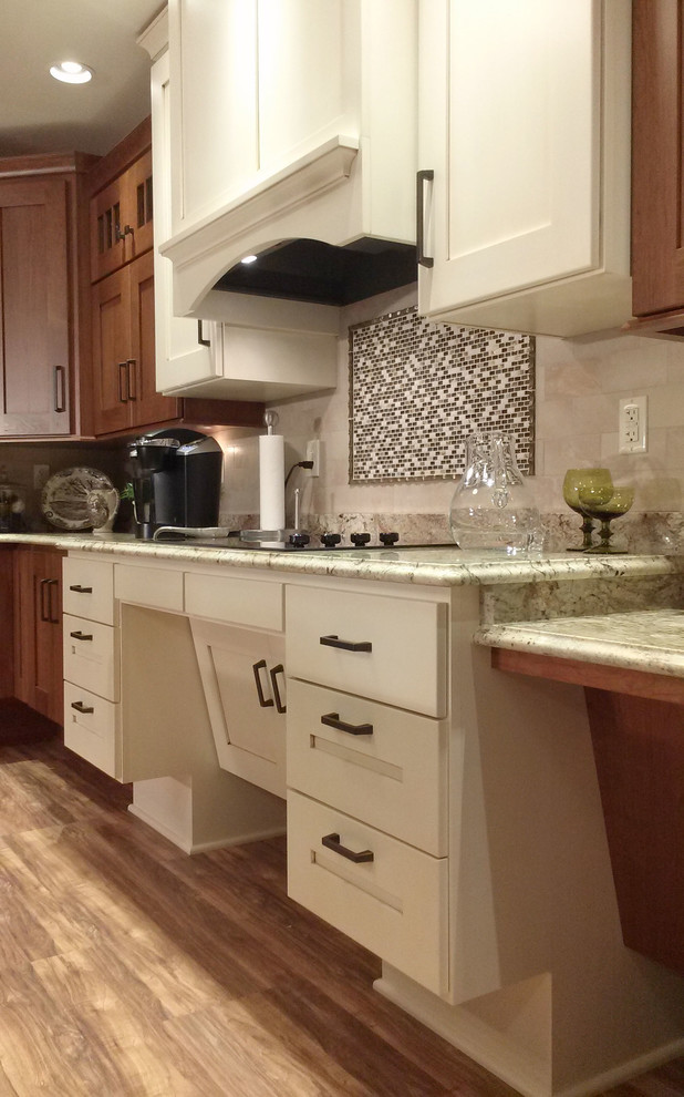 Open concept kitchen - large transitional l-shaped medium tone wood floor open concept kitchen idea with an undermount sink, shaker cabinets, medium tone wood cabinets, granite countertops, beige backsplash, ceramic backsplash, white appliances and an island