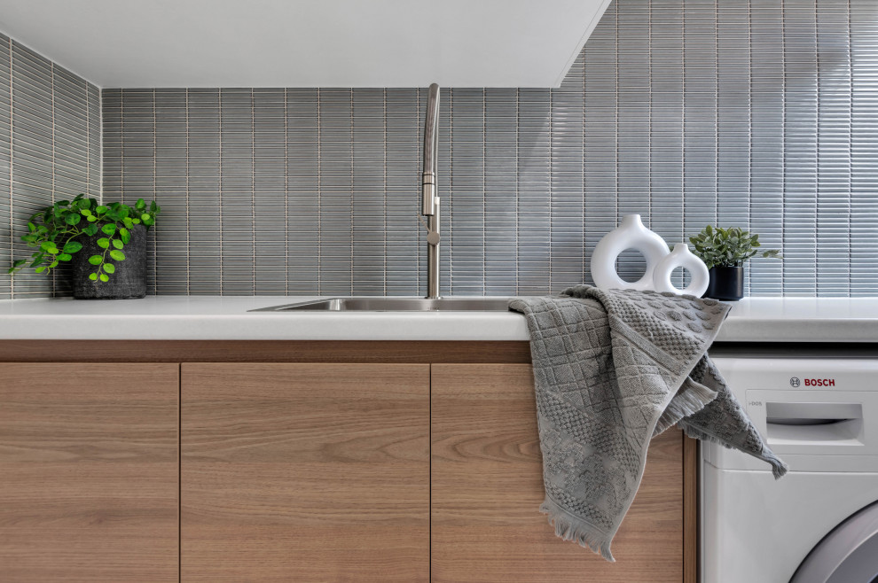 Photo of a contemporary laundry room in Adelaide.