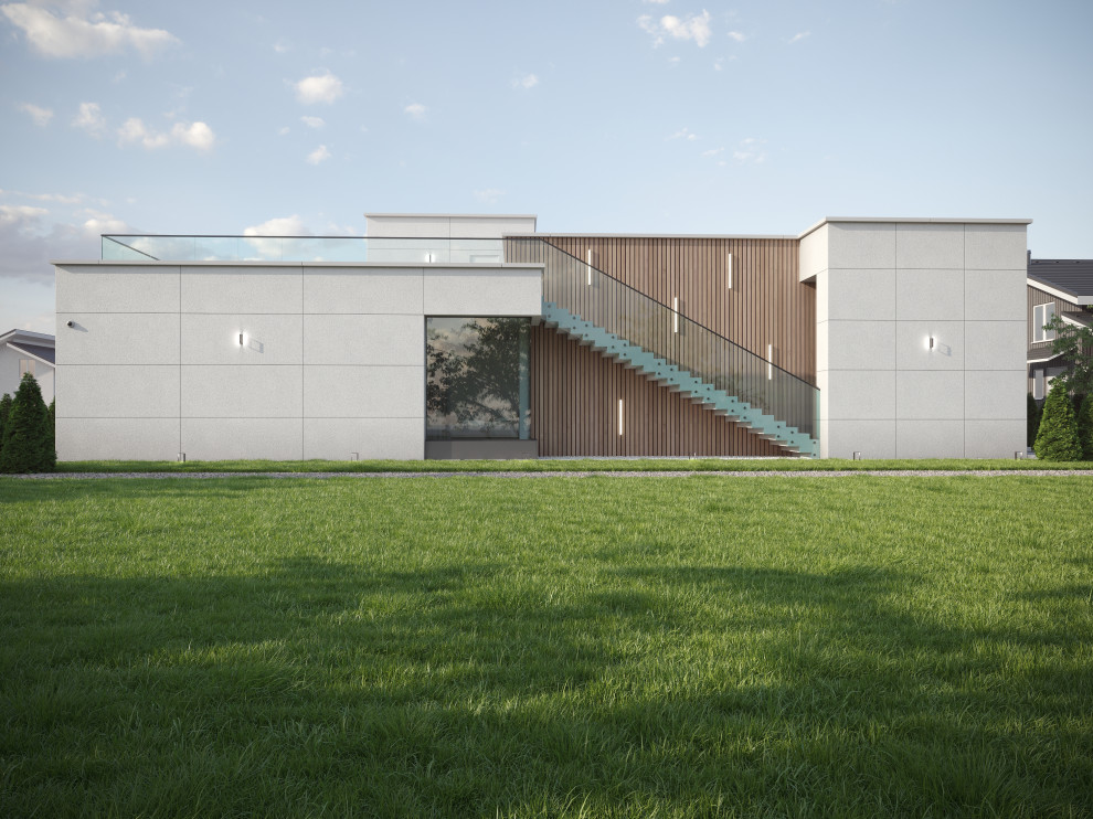 Двухэтажный дом с плоской кровлей