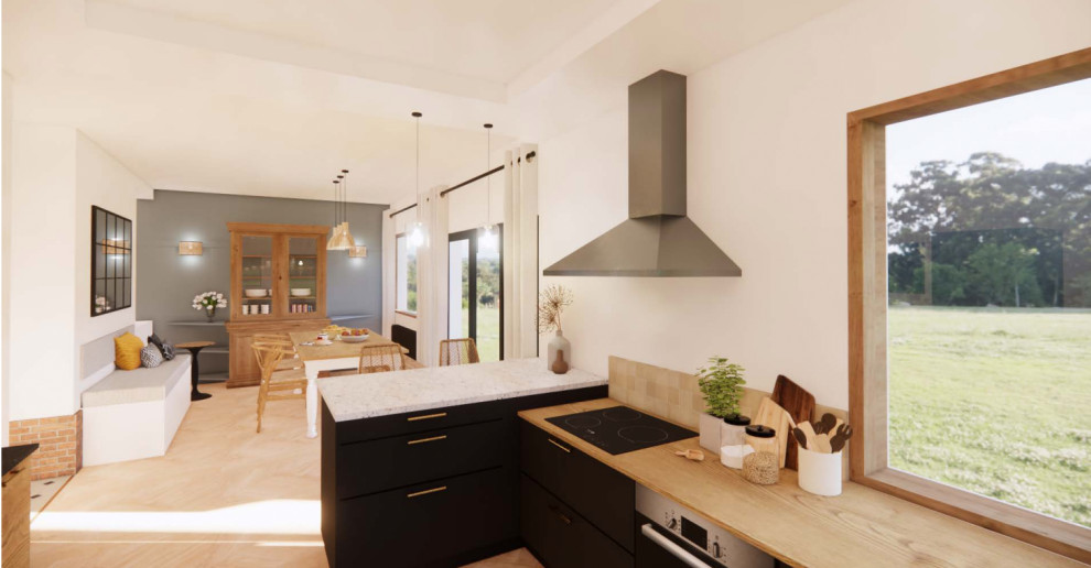 Design ideas for a mid-sized country u-shaped eat-in kitchen in Other with an undermount sink, beaded inset cabinets, light wood cabinets, beige splashback, black appliances, light hardwood floors, multiple islands, black benchtop and recessed.