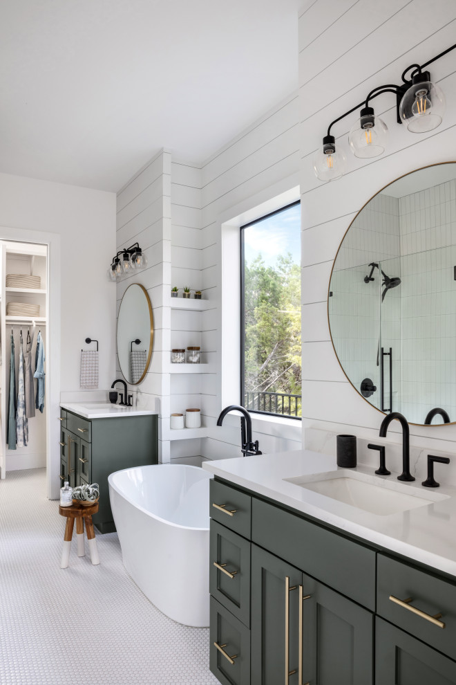 Inspiration for a mid-sized country master bathroom in Austin with shaker cabinets, green cabinets, a freestanding tub, a curbless shower, white tile, subway tile, white walls, cement tiles, an undermount sink, engineered quartz benchtops, white floor, a hinged shower door, white benchtops, a niche, a double vanity, a built-in vanity and planked wall panelling.