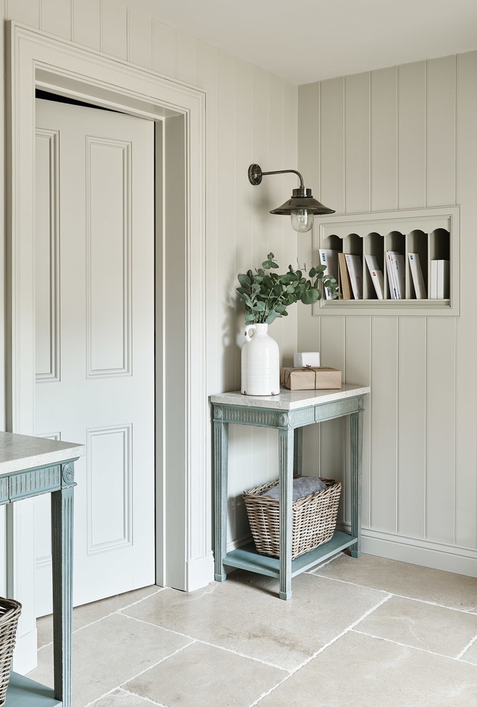Photo of a traditional entryway in Wiltshire with grey walls and beige floor.