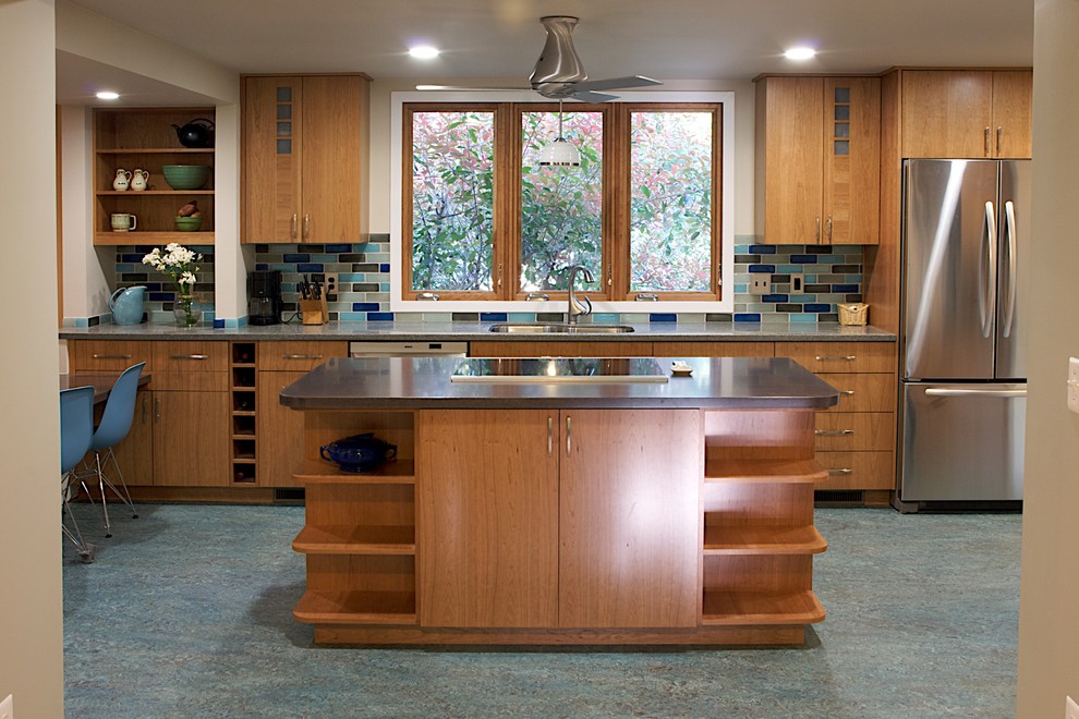 Inspiration for a traditional eat-in kitchen in DC Metro with an undermount sink, flat-panel cabinets, medium wood cabinets, multi-coloured splashback, stainless steel appliances and turquoise floor.