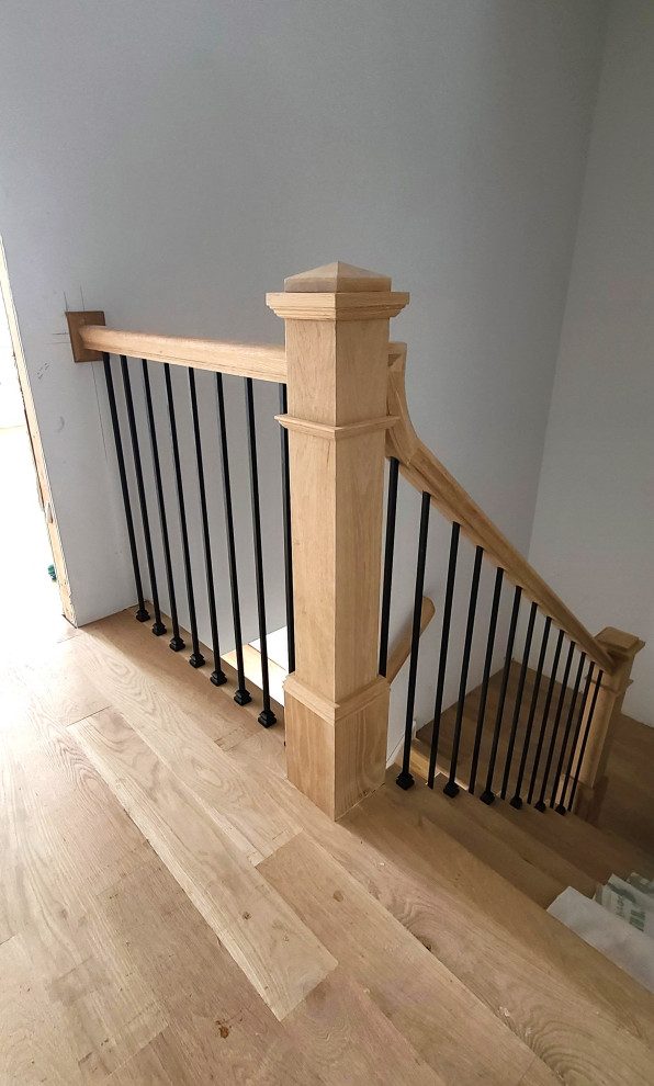 Идея дизайна: угловая деревянная лестница среднего размера в современном стиле с деревянными ступенями и перилами из смешанных материалов