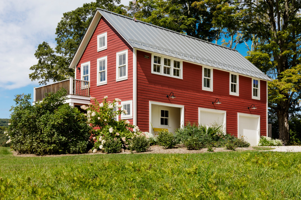 Mid-sized cottage red two-story wood gable roof idea in Boston with a metal roof