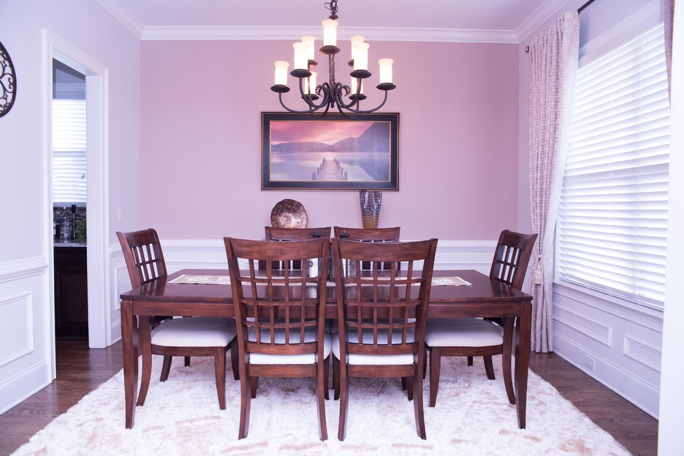 Photo of a mid-sized traditional separate dining room in Atlanta with beige walls and no fireplace.